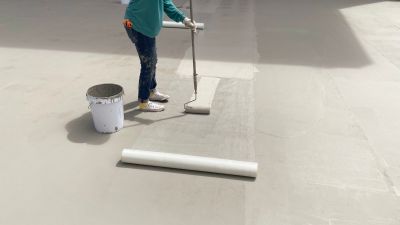 Water Proof Sealer being Applied to Flat Roof